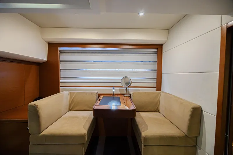  Yacht Photos Pics Luxurious interior of 2013 Prestige 550 S yacht with elegant seating and modern decor.