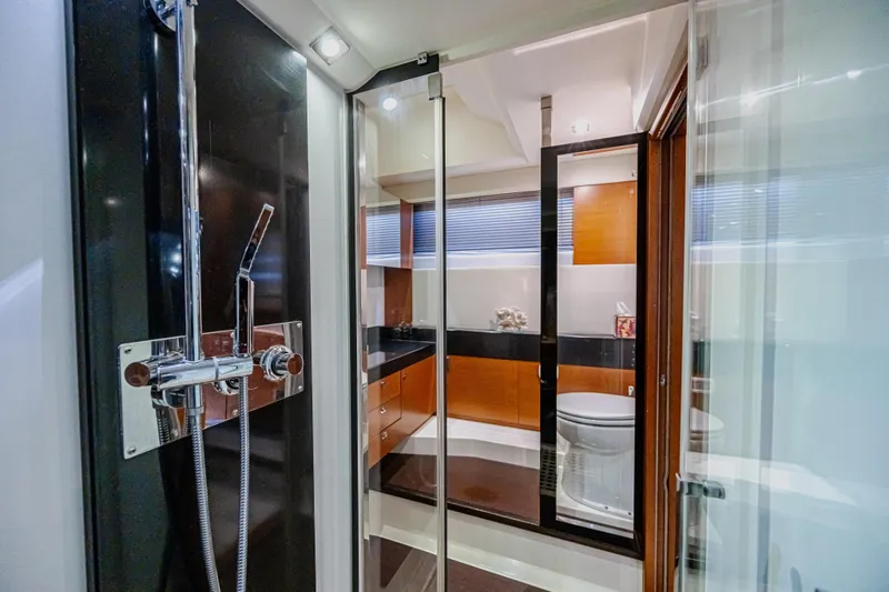  Yacht Photos Pics Luxurious bathroom interior of 2013 Prestige 550 S yacht with modern shower design.