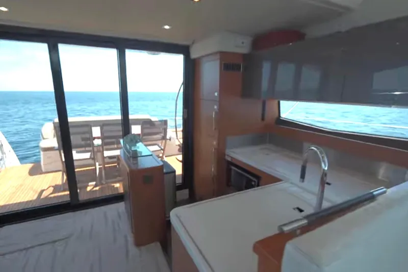  Yacht Photos Pics Luxurious interior of 2013 Prestige 550 S yacht with ocean view.