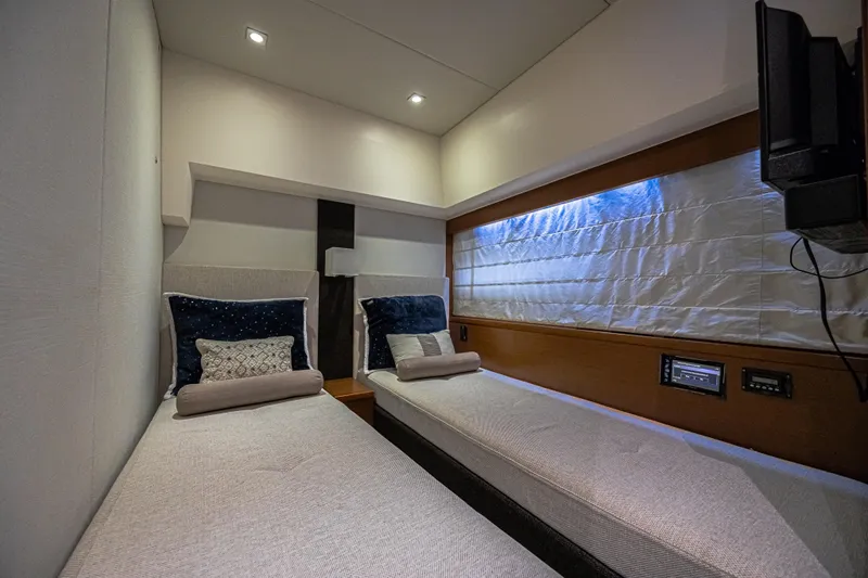  Yacht Photos Pics Luxurious twin cabin interior of 2013 Prestige 550 S yacht with modern decor.