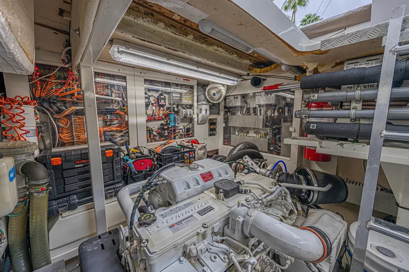  Yacht Photos Pics Engine room of 2013 Prestige 550 S yacht with complex wiring and machinery.