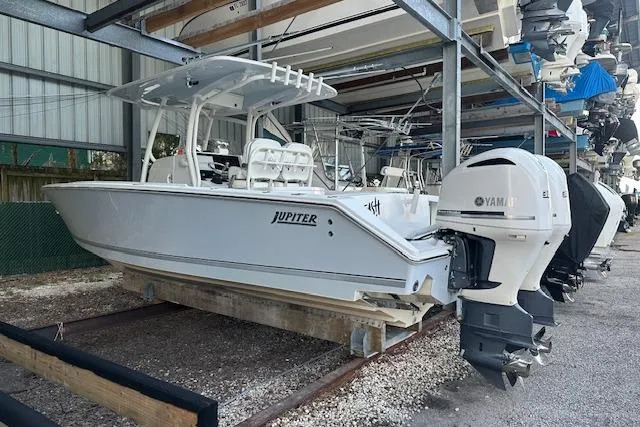  Yacht Photos Pics 2015 Jupiter 30 CC boat with Yamaha engines in storage facility.