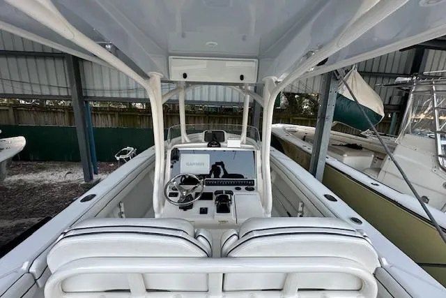  Yacht Photos Pics 2015 Jupiter 30 CC boat interior with steering console and seating.
