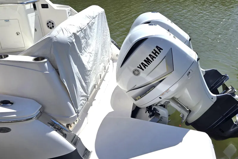  Yacht Photos Pics 2021 Regal 36 XO boat with Yamaha V8 outboard engines on water.