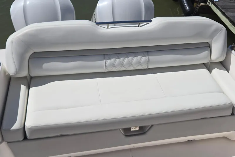  Yacht Photos Pics Luxury seating on 2021 Regal 36 XO boat, featuring elegant white upholstery.