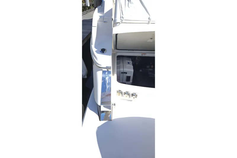  Yacht Photos Pics 2021 Regal 36 XO boat engine compartment with open hatch, showcasing interior details.