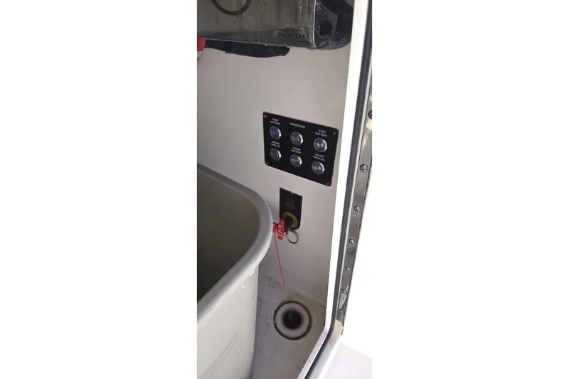  Yacht Photos Pics Control panel inside 2021 Regal 36 XO boat, featuring switches and wiring.
