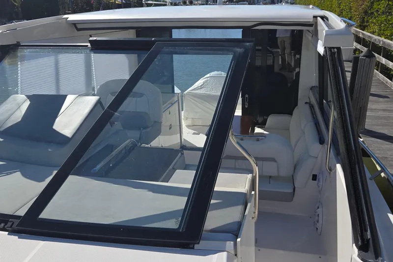  Yacht Photos Pics 2021 Regal 36 XO yacht interior with sleek seating and modern design.