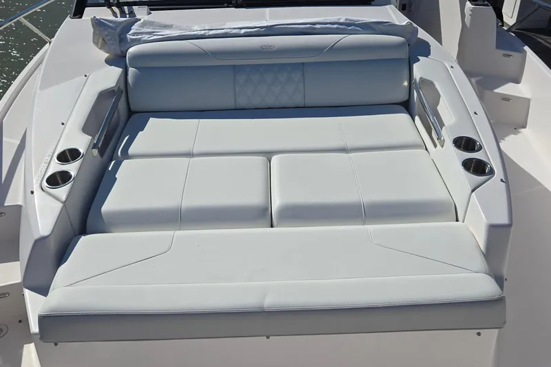  Yacht Photos Pics 2021 Regal 36 XO boat with luxurious white seating and cup holders.