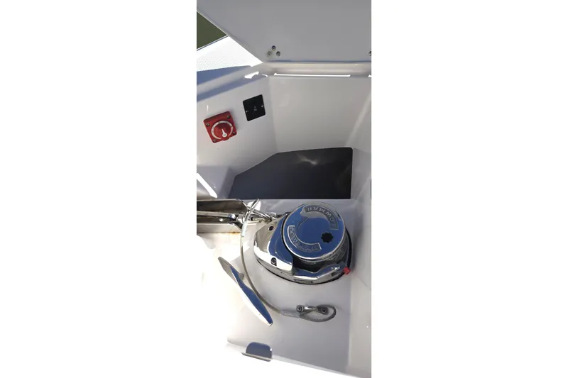  Yacht Photos Pics Anchor compartment of 2021 Regal 36 XO boat with control panel and winch.