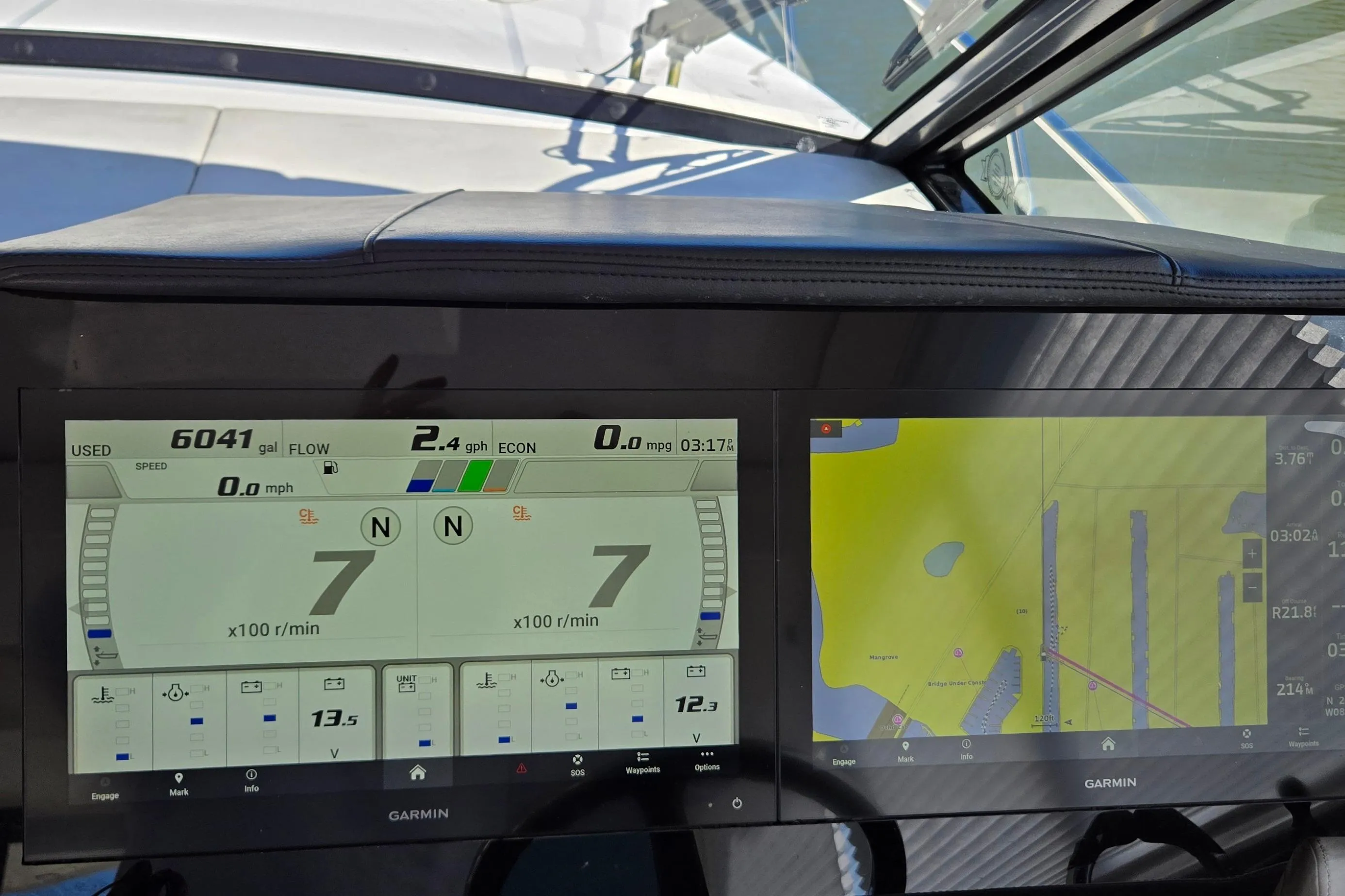 Dashboard of a 2021 Regal 36 XO boat with Garmin navigation display.