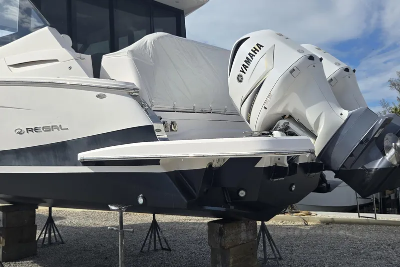  Yacht Photos Pics 2021 Regal 36 XO boat with Yamaha outboard engines on display.