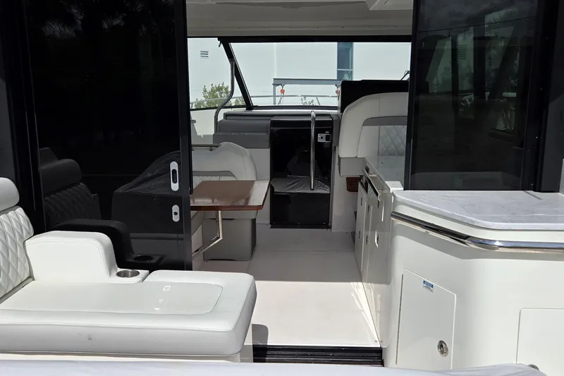  Yacht Photos Pics Interior view of 2021 Regal 36 XO yacht, featuring luxurious seating and modern design.