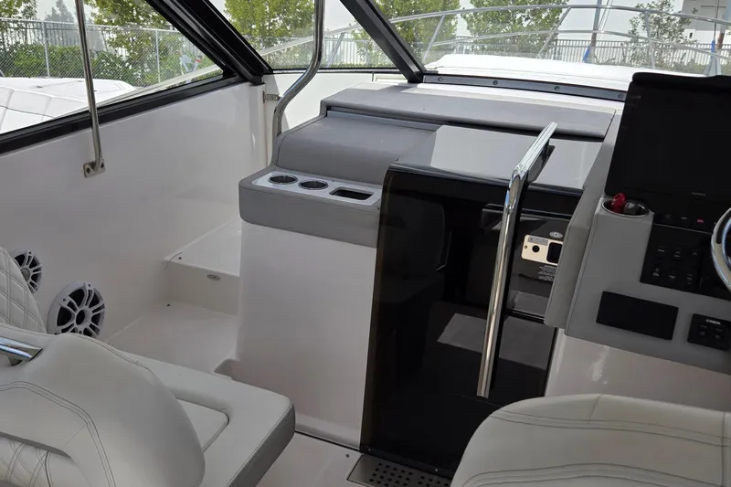  Yacht Photos Pics 2021 Regal 36 XO boat interior with modern helm and seating area.