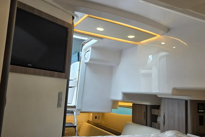  Yacht Photos Pics Interior of 2021 Regal 36 XO yacht with modern design and built-in TV.