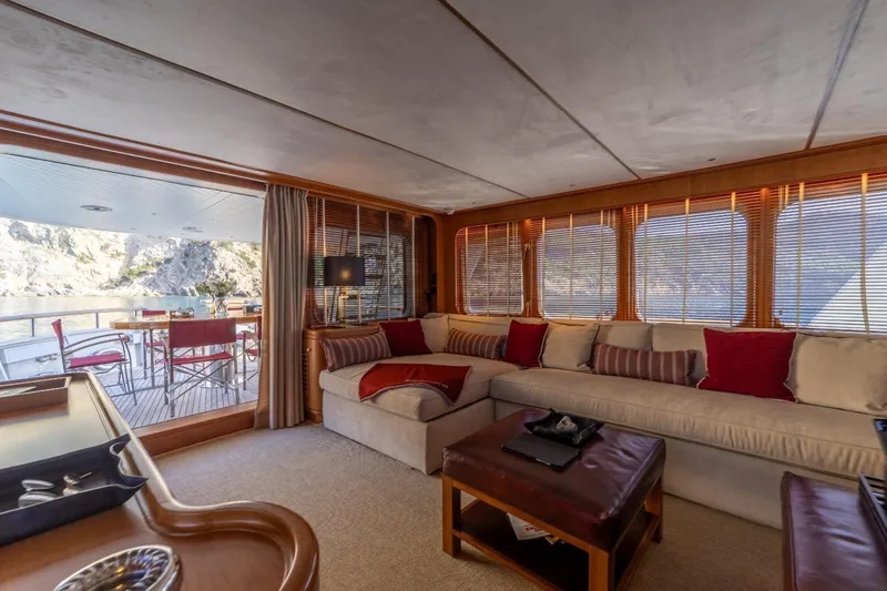  Yacht Photos Pics Luxurious interior of 1986 Moonen 85 yacht with elegant seating and scenic views.