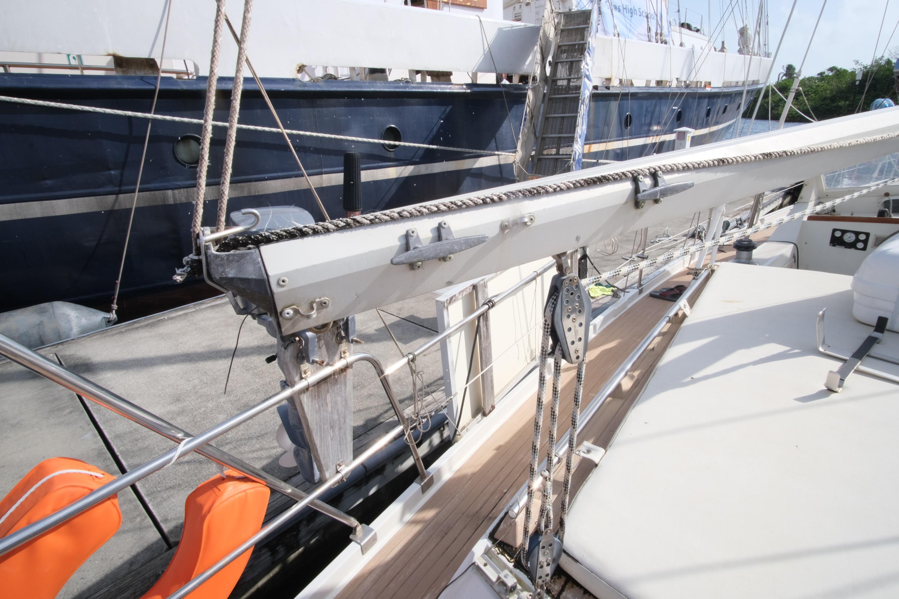 1984 Amel Maramu 45 sailboat deck with rigging and safety equipment.