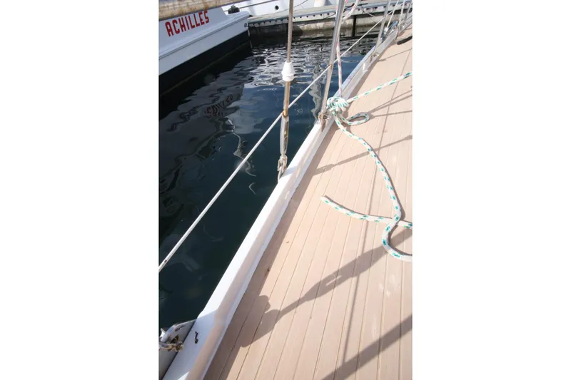 Blue Song Yacht Photos Pics Deck view of 1984 Amel Maramu 45 sailboat docked at marina.