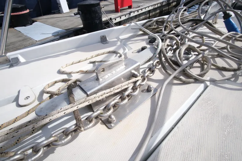 Blue Song Yacht Photos Pics Deck of 1984 Amel Maramu 45 sailboat with ropes and chains.