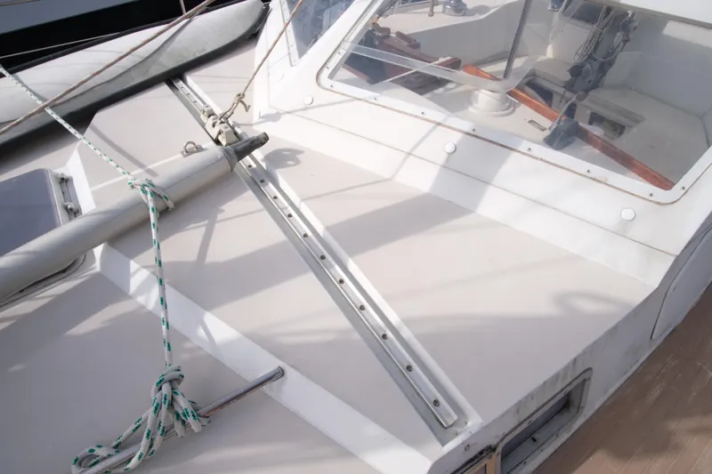 Blue Song Yacht Photos Pics 1984 Amel Maramu 45 sailboat deck with rigging and cockpit view.