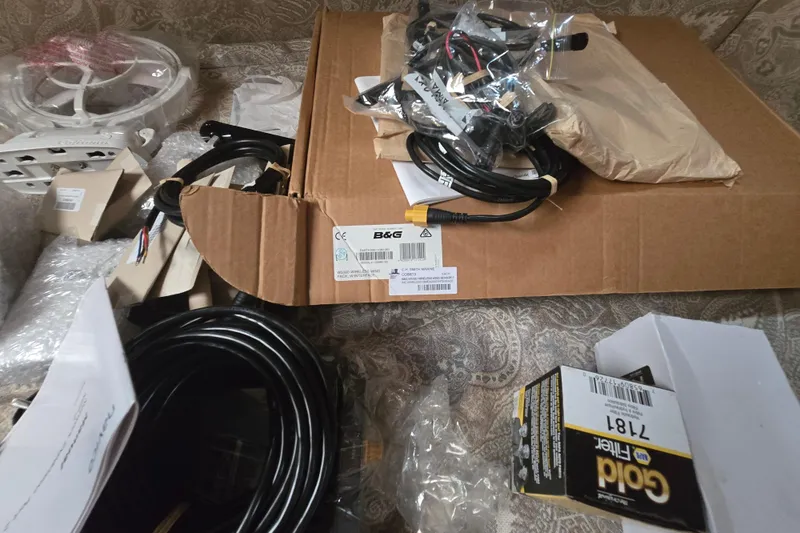 Blue Song Yacht Photos Pics Assorted marine equipment and cables for 1984 Amel Maramu 45 sailboat.