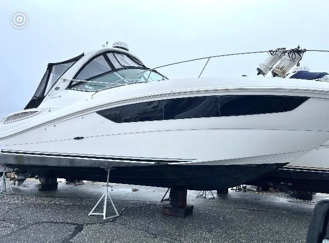 Yacht Photos Pics 2016 Sea Ray 330 Sundancer yacht on stands, side view, outdoors.