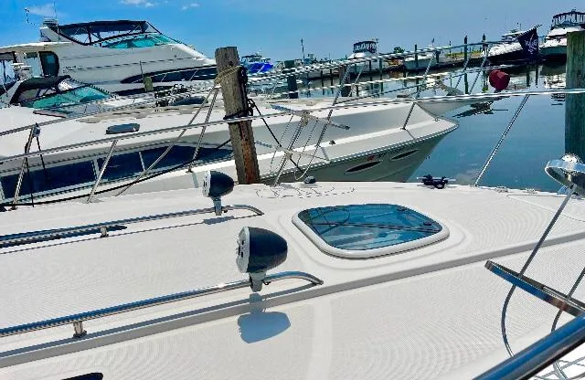  Yacht Photos Pics 2016 Sea Ray 330 Sundancer docked at marina with other boats.