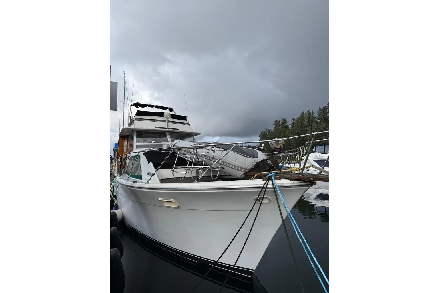 1977 Pacemaker 40 Motor Yacht docked under cloudy skies.