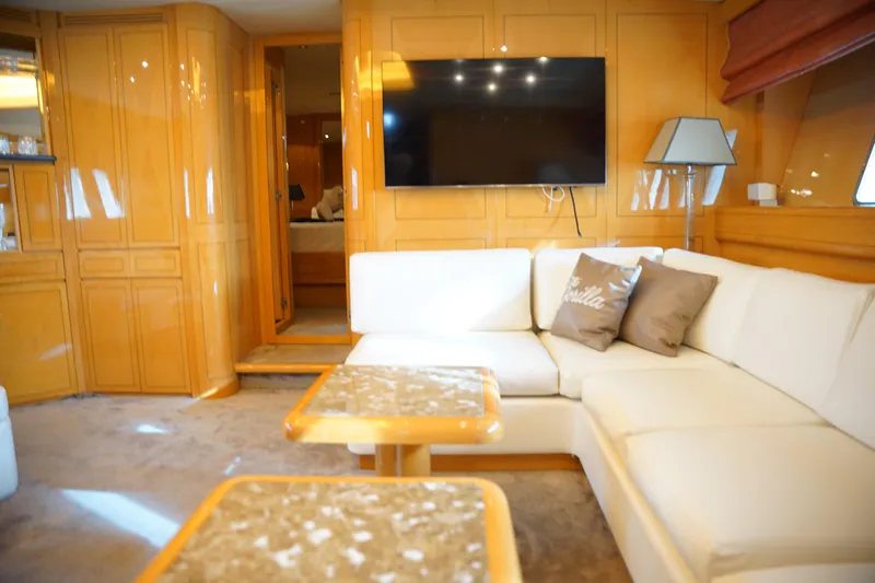  Yacht Photos Pics Luxurious interior of 1999 Mangusta 80 yacht with elegant seating and modern decor.