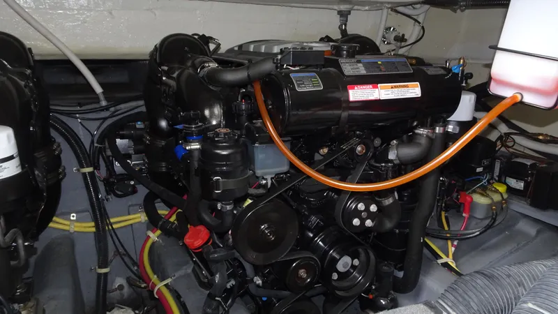 Sc Yacht Photos Pics Engine compartment of 2018 Carver C34 Coupe, showcasing detailed mechanical components.