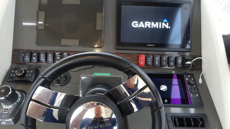 Sc Yacht Photos Pics 2018 Carver C34 Coupe dashboard with Garmin navigation system and steering wheel.
