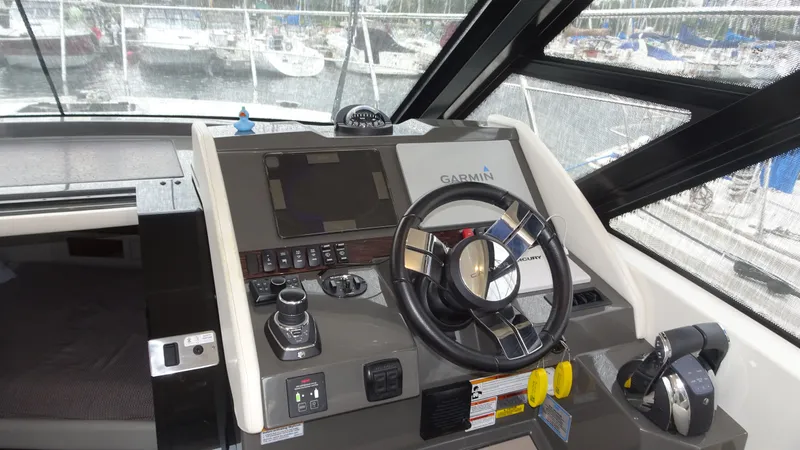 Sc Yacht Photos Pics 2018 Carver C34 Coupe helm with Garmin navigation system and modern controls.