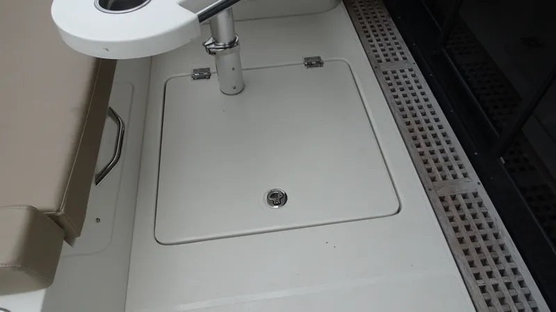 Sc Yacht Photos Pics 2018 Carver C34 Coupe deck area with seating and storage compartment.