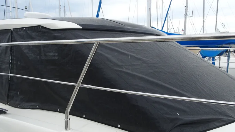 Sc Yacht Photos Pics 2018 Carver C34 Coupe yacht with protective cover in marina.