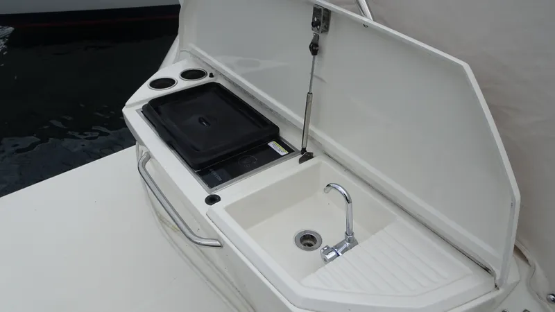 Sc Yacht Photos Pics Outdoor sink and grill on 2018 Carver C34 Coupe yacht deck.