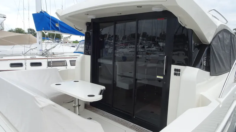 Sc Yacht Photos Pics 2018 Carver C34 Coupe yacht with sleek design and spacious outdoor seating area.