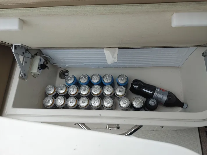 Sc Yacht Photos Pics Cooler in 2018 Carver C34 Coupe filled with soda cans and a large bottle.