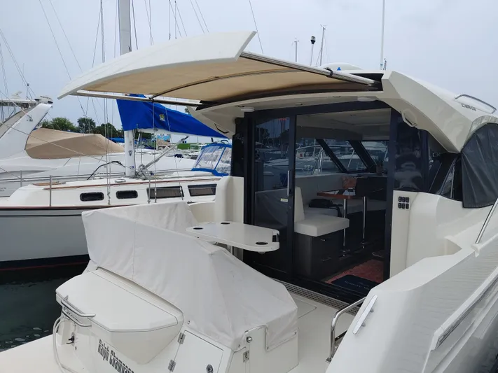 Sc Yacht Photos Pics 2018 Carver C34 Coupe yacht with open deck, docked at marina.
