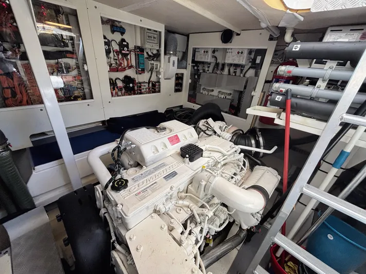  Yacht Photos Pics Engine room of a 2014 Prestige 550 yacht, showcasing machinery and equipment.