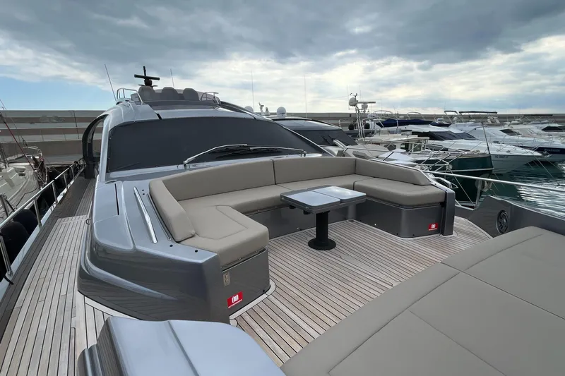  Yacht Photos Pics 2024 Pershing 8X yacht with sleek design and spacious deck seating.