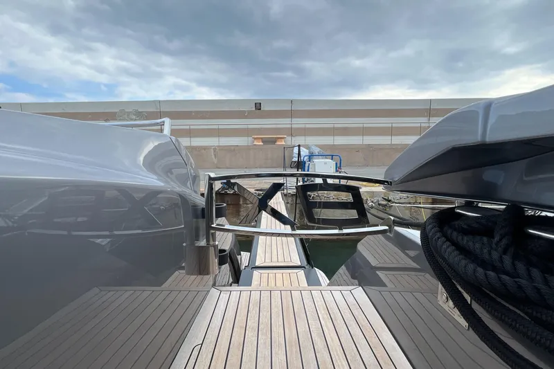  Yacht Photos Pics 2024 Pershing 8X yacht docked, showcasing sleek design and modern features.