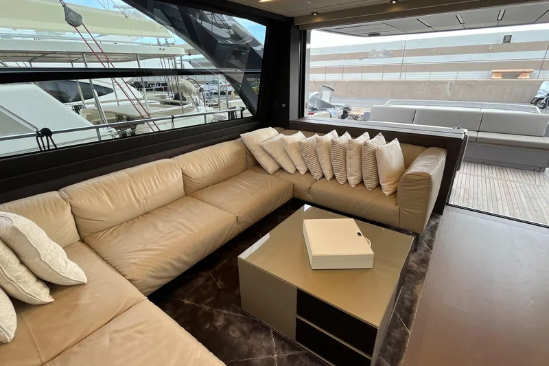  Yacht Photos Pics Luxurious interior of 2024 Pershing 8X yacht with beige leather seating and modern decor.