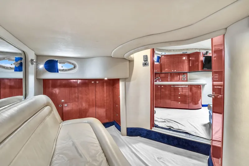  Yacht Photos Pics Luxurious interior of 2004 Sea Ray 460 Sundancer yacht with elegant wood cabinetry.