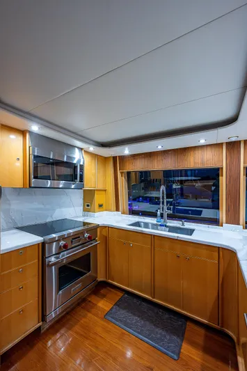 Wire We Here Yacht Photos Pics Modern kitchen in 1995 Crescent Westport Pilothouse yacht with stainless steel appliances.