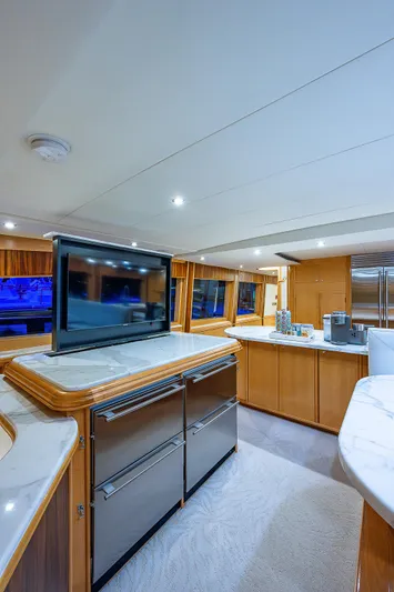 Wire We Here Yacht Photos Pics Modern kitchen interior of 1995 Crescent Westport Pilothouse yacht with stainless steel appliances.
