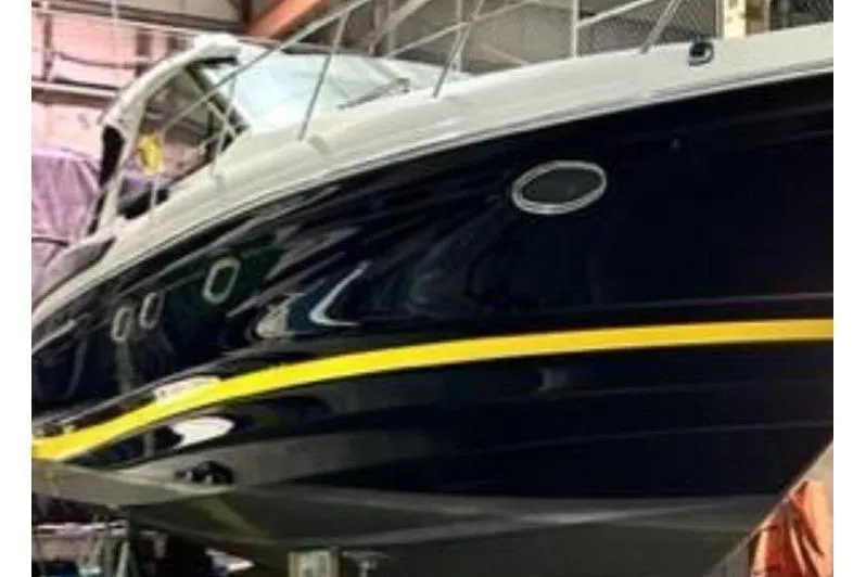  Yacht Photos Pics 2010 Regal 44 Sport Coupe boat in a storage facility.