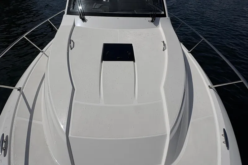 Lieuanna Yacht Photos Pics 2024 Pursuit OS 355 Offshore boat deck with sleek design and stainless steel railings.