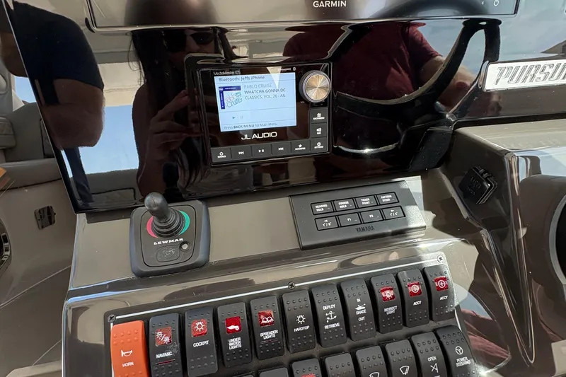 Lieuanna Yacht Photos Pics Control panel of 2024 Pursuit OS 355 Offshore boat with audio and navigation systems.
