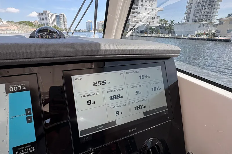 Lieuanna Yacht Photos Pics 2024 Pursuit OS 355 Offshore boat dashboard with navigation and trip data display.