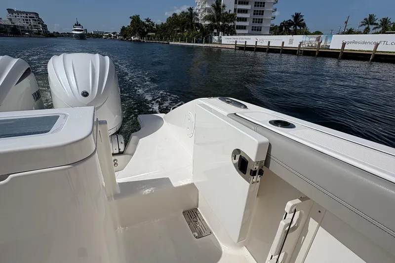 Lieuanna Yacht Photos Pics 2024 Pursuit OS 355 Offshore boat with dual Yamaha engines on a sunny waterway.